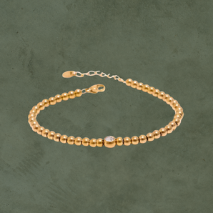 Pulsera de Esferas con Zirconia y Cierre Ajustable Dorada