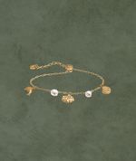 Pulsera con Perlas y Dijes Marinos